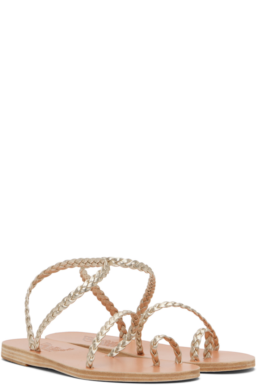 Handcrafted braided nappa leather flat sandals in silver tone.

· Open toe
· Fixed toe strap
· Fixed ankle strap
· Logo embossed at leather footbed
· Textured rubber heel
· Stacked leather sole

Supplier color: Platinum