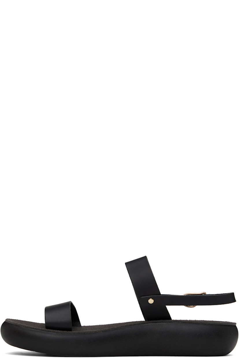 Handcrafted chemical-free buffed leather flat sandals in black.

· Raw edges throughout
· Open toe
· Pin-buckle ankle strap
· Logo embossed at padded suede footbed
· Logo-embossed rubber sole

Supplier color: Black