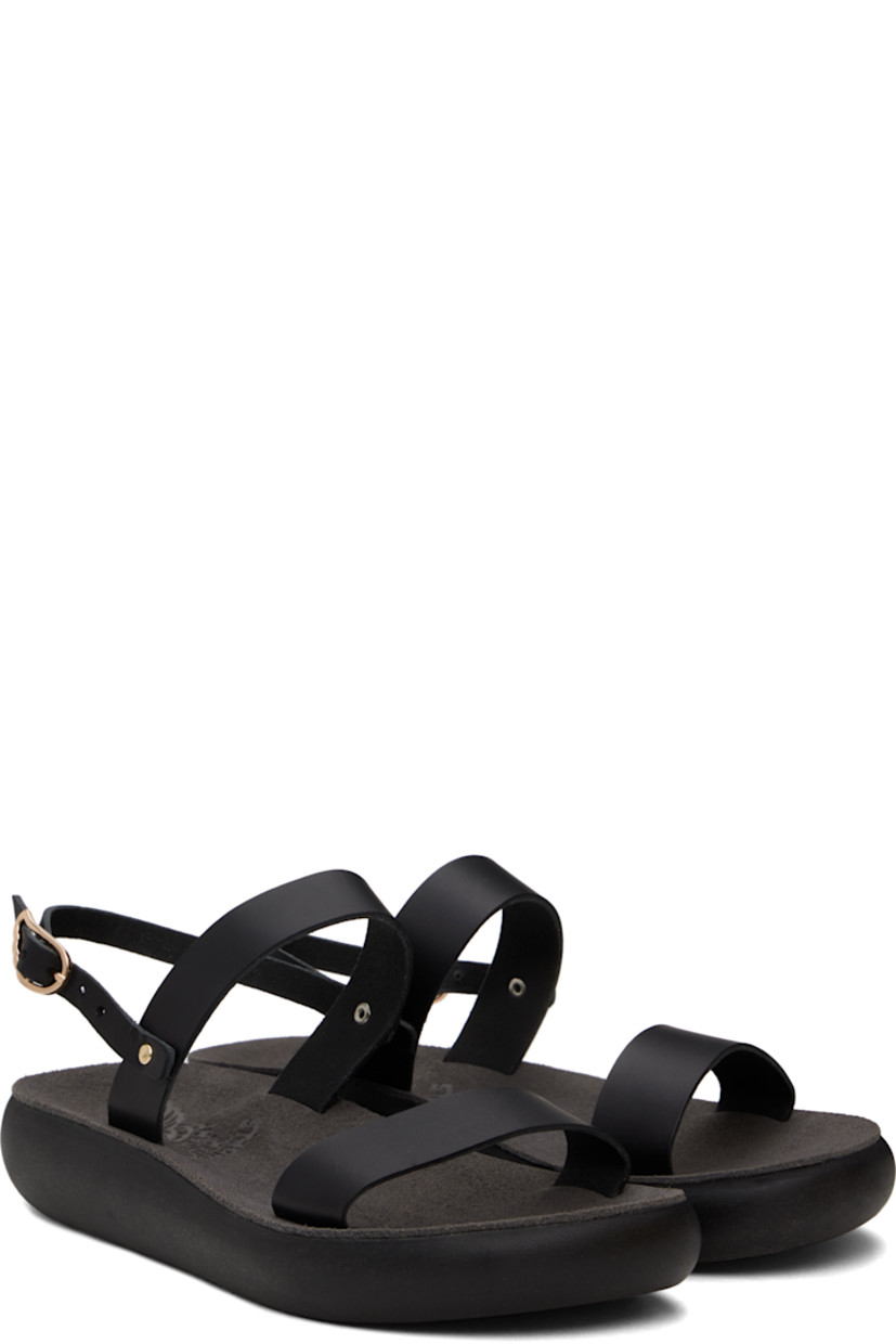 Handcrafted chemical-free buffed leather flat sandals in black.

· Raw edges throughout
· Open toe
· Pin-buckle ankle strap
· Logo embossed at padded suede footbed
· Logo-embossed rubber sole

Supplier color: Black