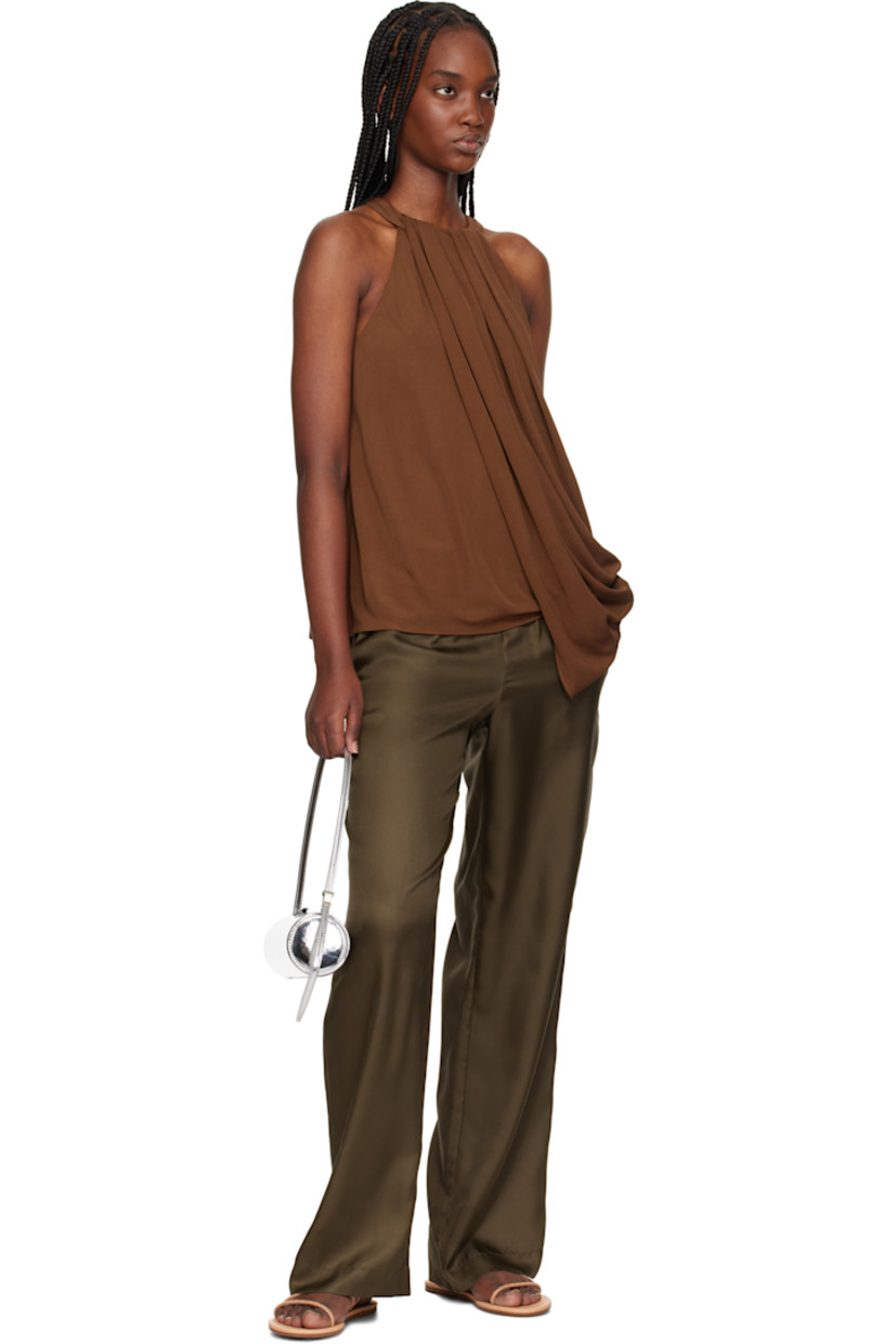 Handcrafted buffed faux-leather flat sandals in beige

· Open toe
· Silver-tone cutouts at straps
· Logo embossed at padded footbed
· Leather midsole
· Treaded rubber sole

Supplier color: Natural/Platinum