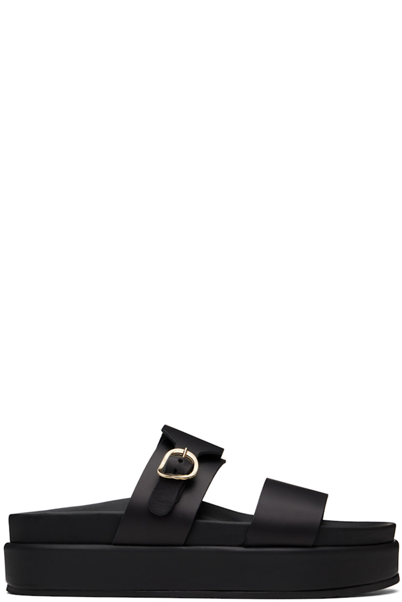 Handcrafted chemical-free buffed leather flat sandals in black.

· Open toe
· Pin-buckle strap at vamp
· Logo embossed at molded footbed
· Treaded rubber platform sole
· Platform: H1.75"

Supplier color: Black