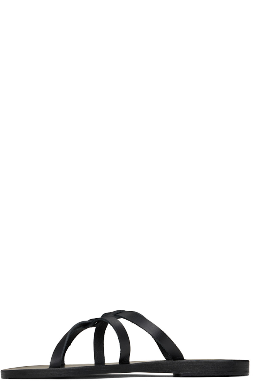 Handcrafted chemical-free buffed leather flat sandals in black.

· Open toe
· Sliding crisscrossing straps at vamp
· Logo embossed at footbed
· Stacked leather sole with rubber injection

Supplier color: Black