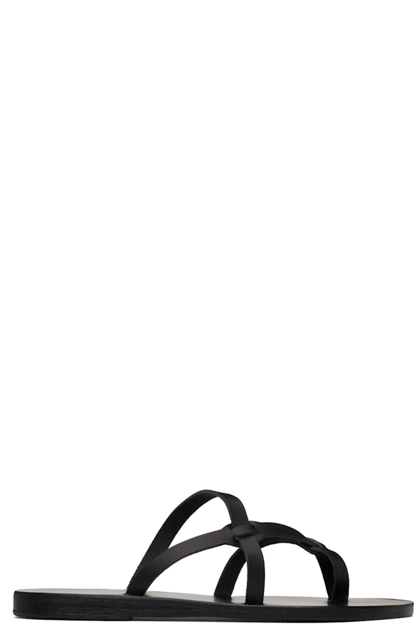 Handcrafted chemical-free buffed leather flat sandals in black.

· Fixed toe strap
· Crisscrossing straps at vamp
· Logo embossed at leather footbed
· Leather sole with crepe rubber injection

Supplier color: Black