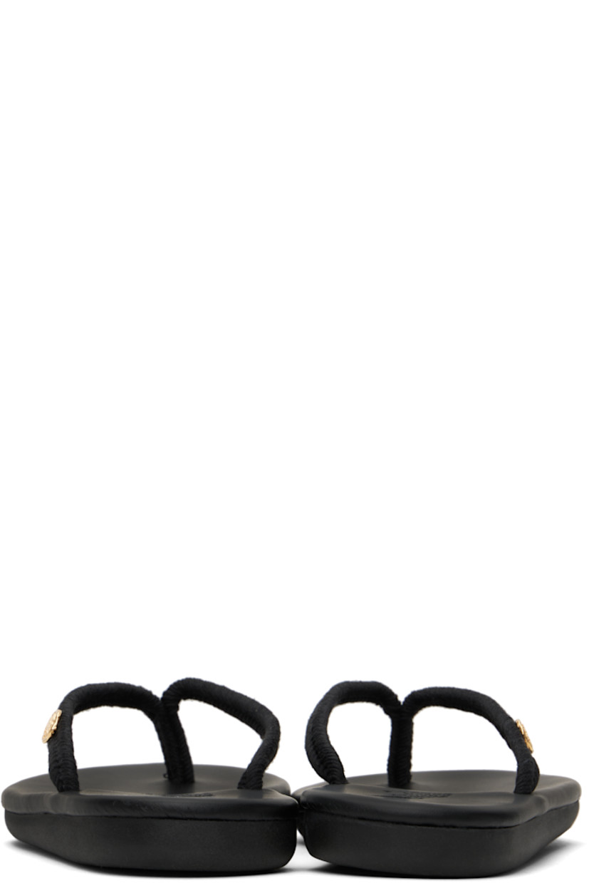 Handcrafted braided cord flip-flops in black.

· Open toe
· Logo hardware at thong-style strap
· Logo embossed at padded leather footbed
· Treaded rubber sole

Supplier color: Black