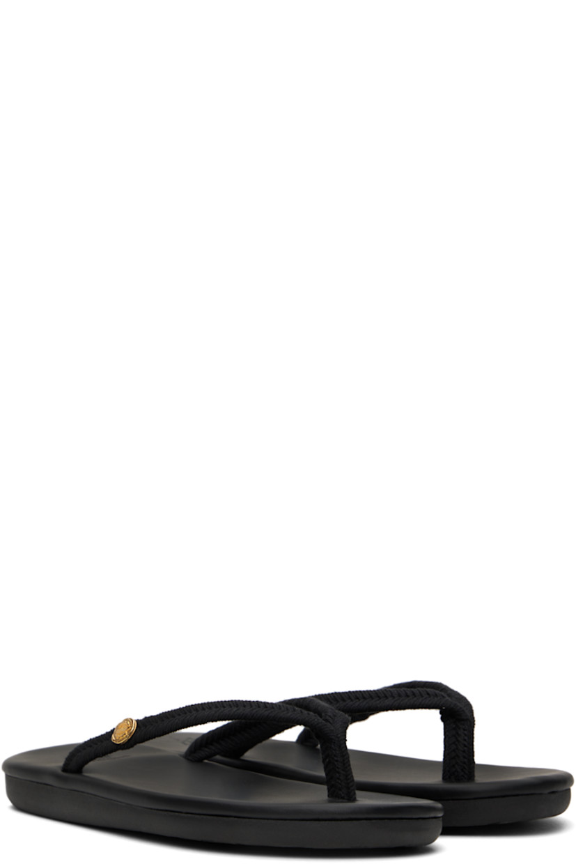 Handcrafted braided cord flip-flops in black.

· Open toe
· Logo hardware at thong-style strap
· Logo embossed at padded leather footbed
· Treaded rubber sole

Supplier color: Black