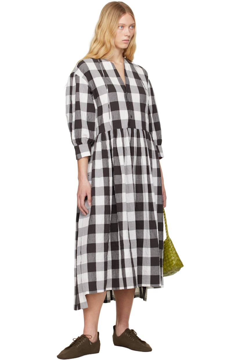 Crinkled stretch cotton poplin midi dress. Check pattern throughout.

· Fixed strap at V-neck
· Button closure
· Gathering at skirt
· Dropped shoulders
· Puff sleeves
· Vented cuffs 

Supplier color: Coffee