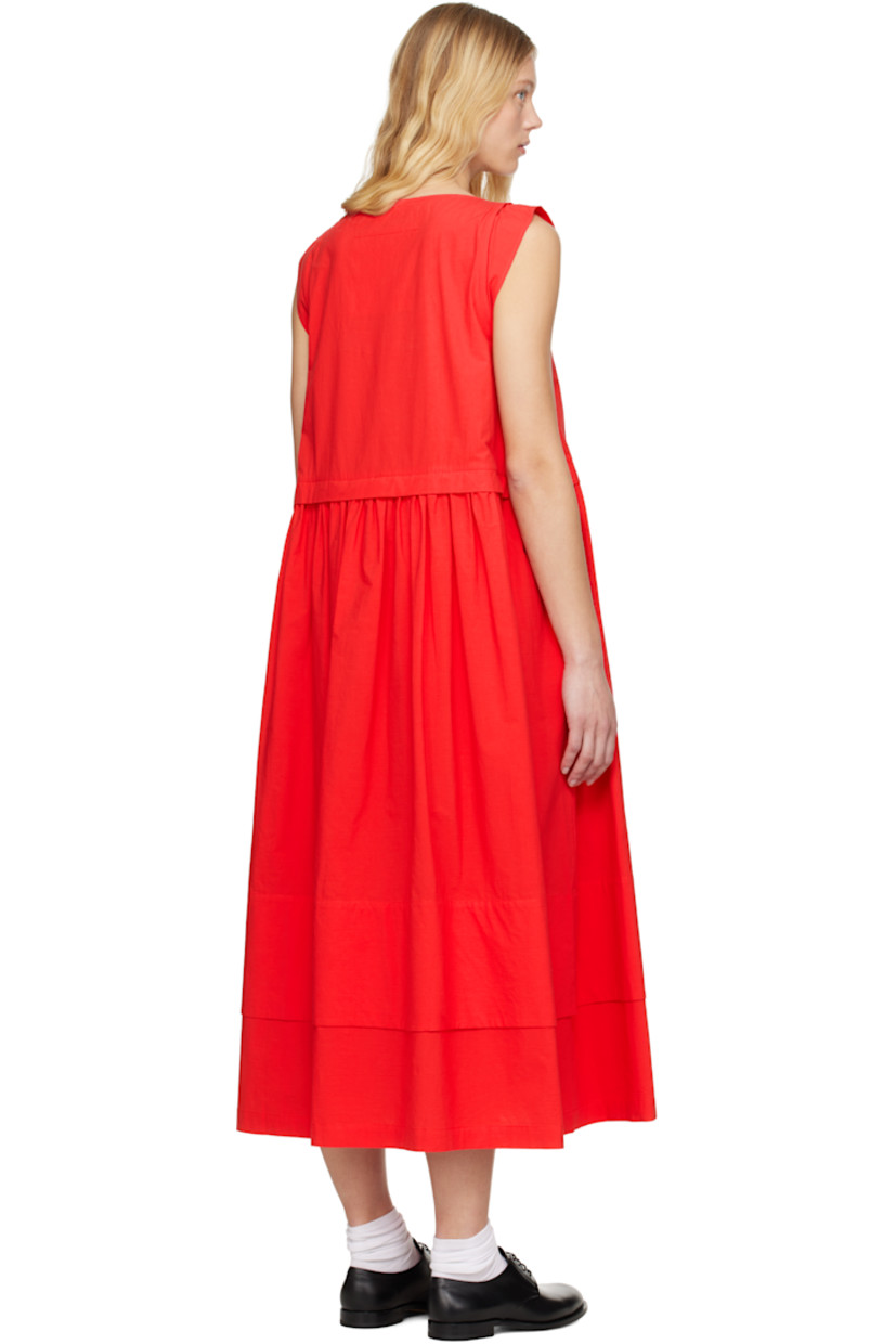 Lightweight cotton ripstop maxi dress.

· Boat neck
· Gathering at skirt
· Tiered hem
· Welt pockets
· Cap sleeves

Supplier color: Jam