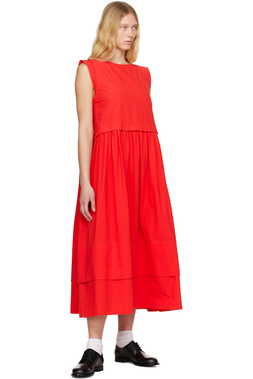 Lightweight cotton ripstop maxi dress.

· Boat neck
· Gathering at skirt
· Tiered hem
· Welt pockets
· Cap sleeves

Supplier color: Jam