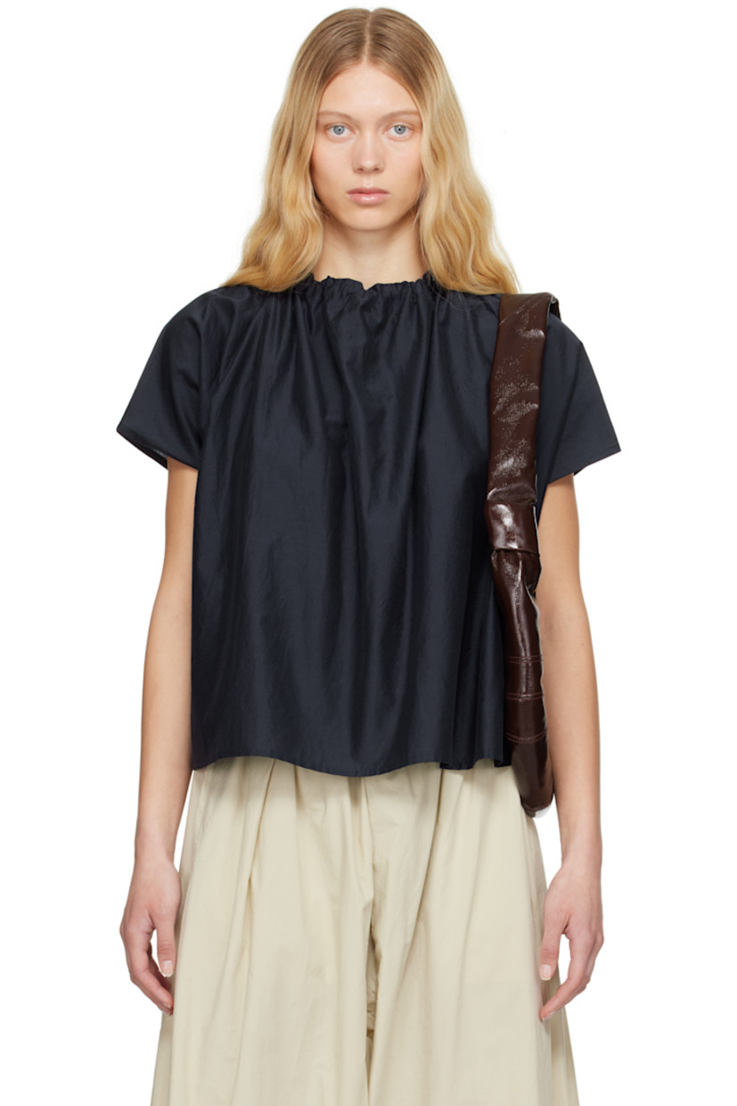 Lightweight cotton- and silk-blend poplin top.

· Gathering at round neck
· Cap sleeves
· Button closure at back collar

Supplier color: Ink