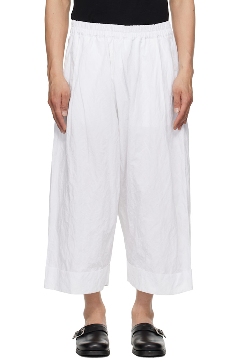 Crinkled cotton-blend poplin trousers. 

· Concealed drawstring at elasticized waistband
· Three-pocket styling
· Pleats at front 
· Cropped legs
· Rolled cuffs

Supplier color: Chalk