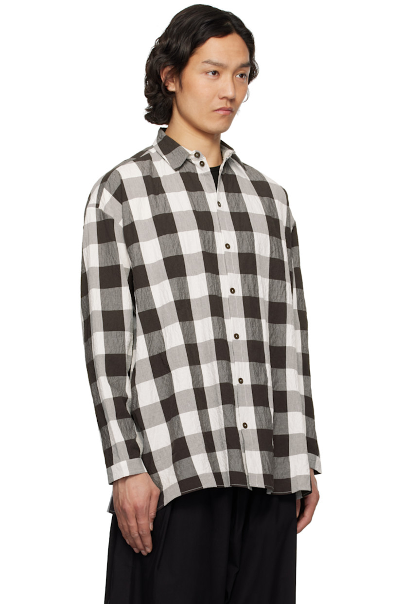 Crinkled stretch cotton poplin shirt. Check pattern printed throughout.

· Spread collar
· Button closure
· Vented side seams
· Dropped shoulders
· Buttoned cuffs

Supplier color: Coffee