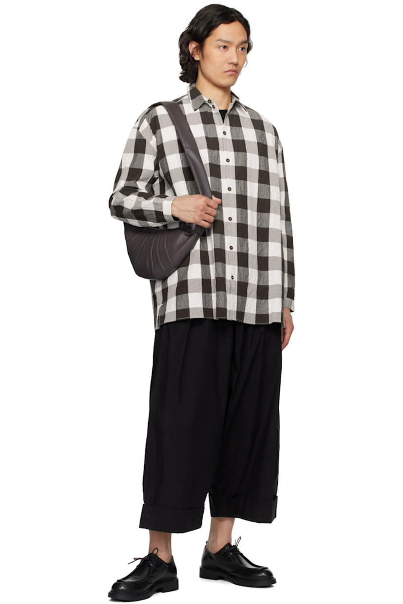 Crinkled stretch cotton poplin shirt. Check pattern printed throughout.

· Spread collar
· Button closure
· Vented side seams
· Dropped shoulders
· Buttoned cuffs

Supplier color: Coffee