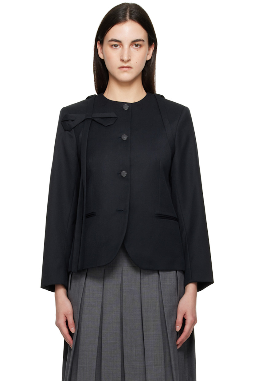 Polyester- and wool-blend cavalry twill blazer. Extended trim throughout.

· Round neck
· Button closure
· Bow appliqué at front
· Welt pockets
· Padded shoulders
· Central vent at back hem
· Welt pocket at interior
· Full logo-woven satin lining

Supplier color: Black
