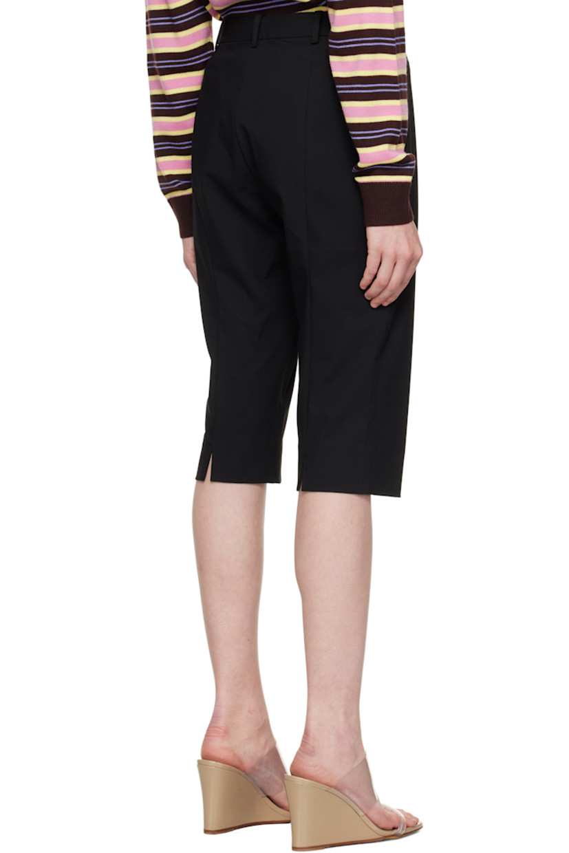 Lightweight stretch polyester- and rayon-blend broadcloth shorts. 

· Mid-rise
· Belt loops
· Zip fly
· Vent at back cuffs

Supplier color: Black