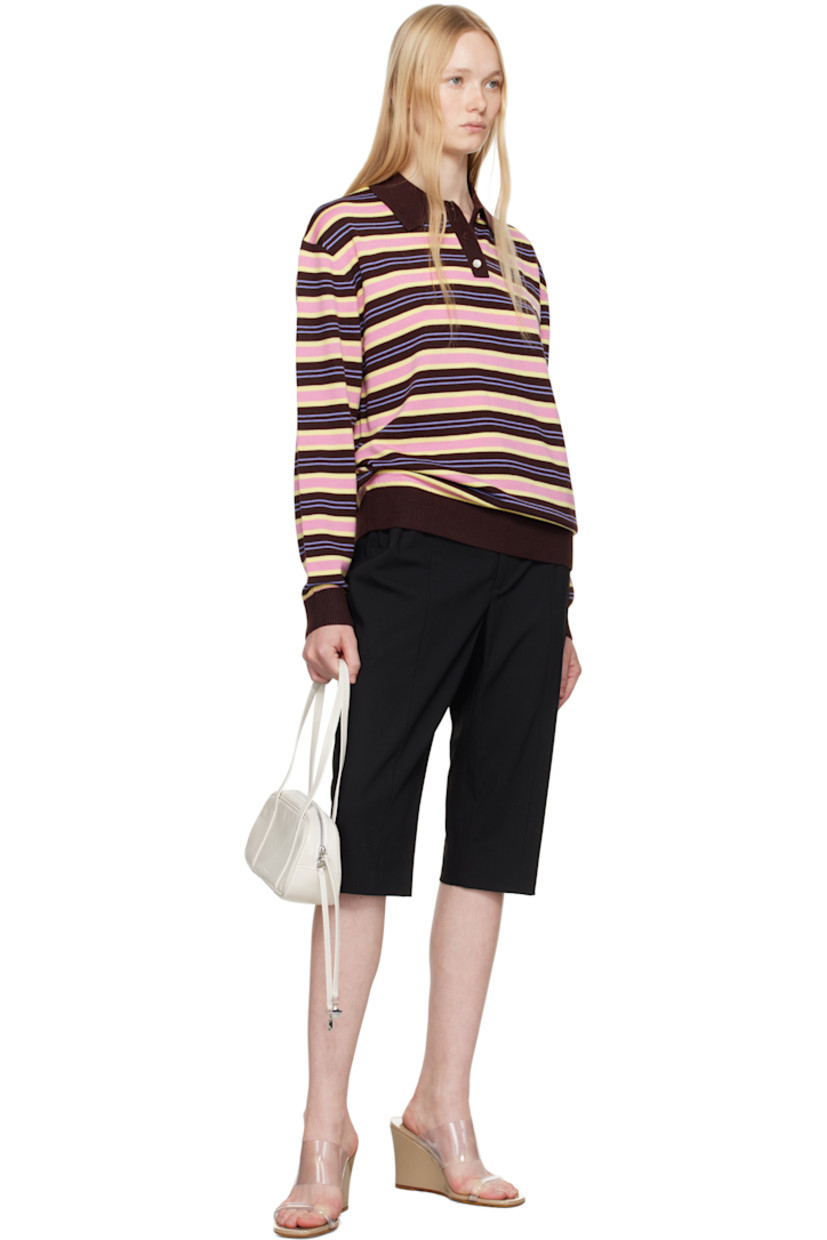 Lightweight stretch polyester- and rayon-blend broadcloth shorts. 

· Mid-rise
· Belt loops
· Zip fly
· Vent at back cuffs

Supplier color: Black