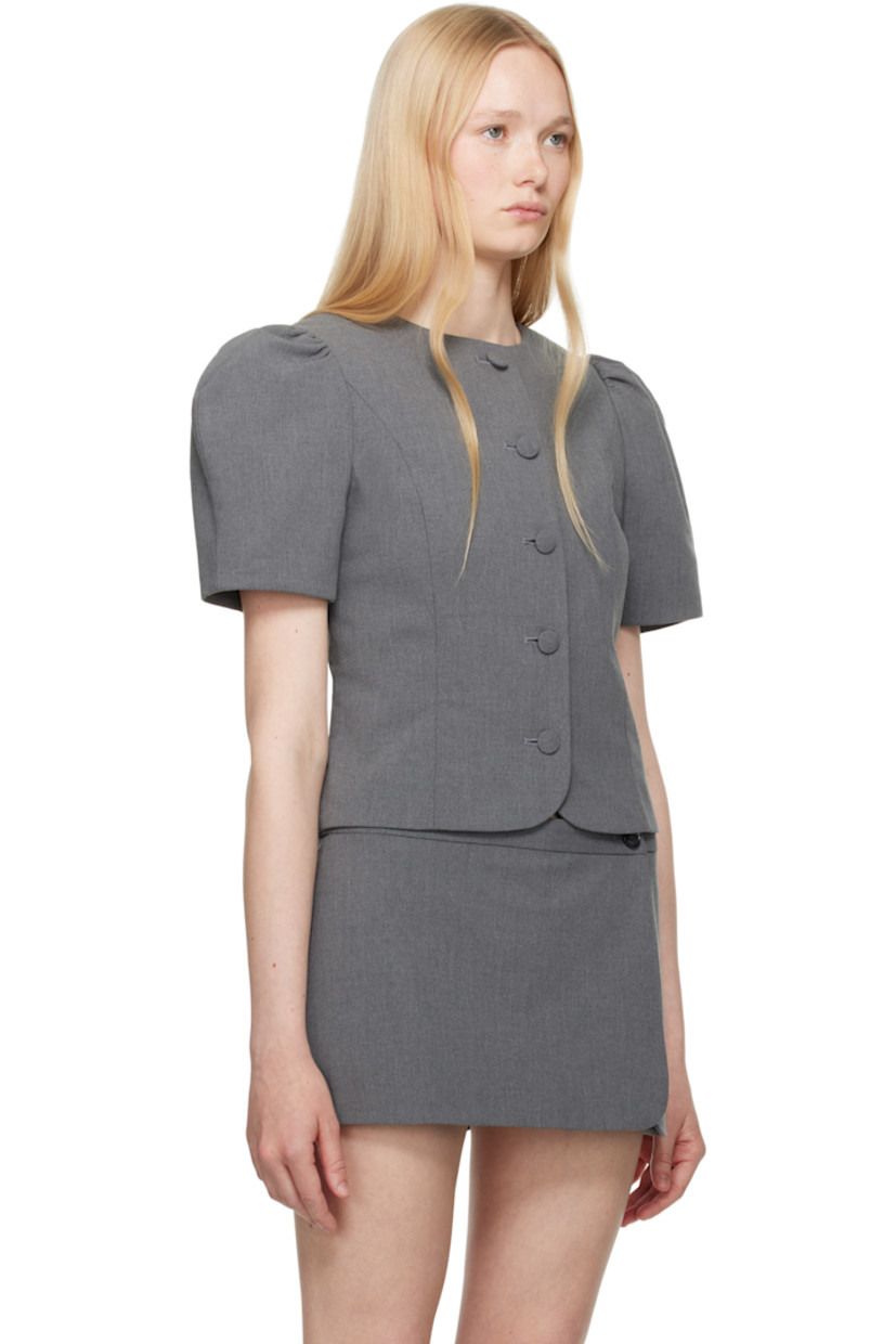 Polyester- and wool-blend twill blouse. 

· Round neck
· Button closure
· Princess seams 
· Padded shoulders
· Puff sleeves
· Logo-woven viscose twill lining

Supplier color: Grey