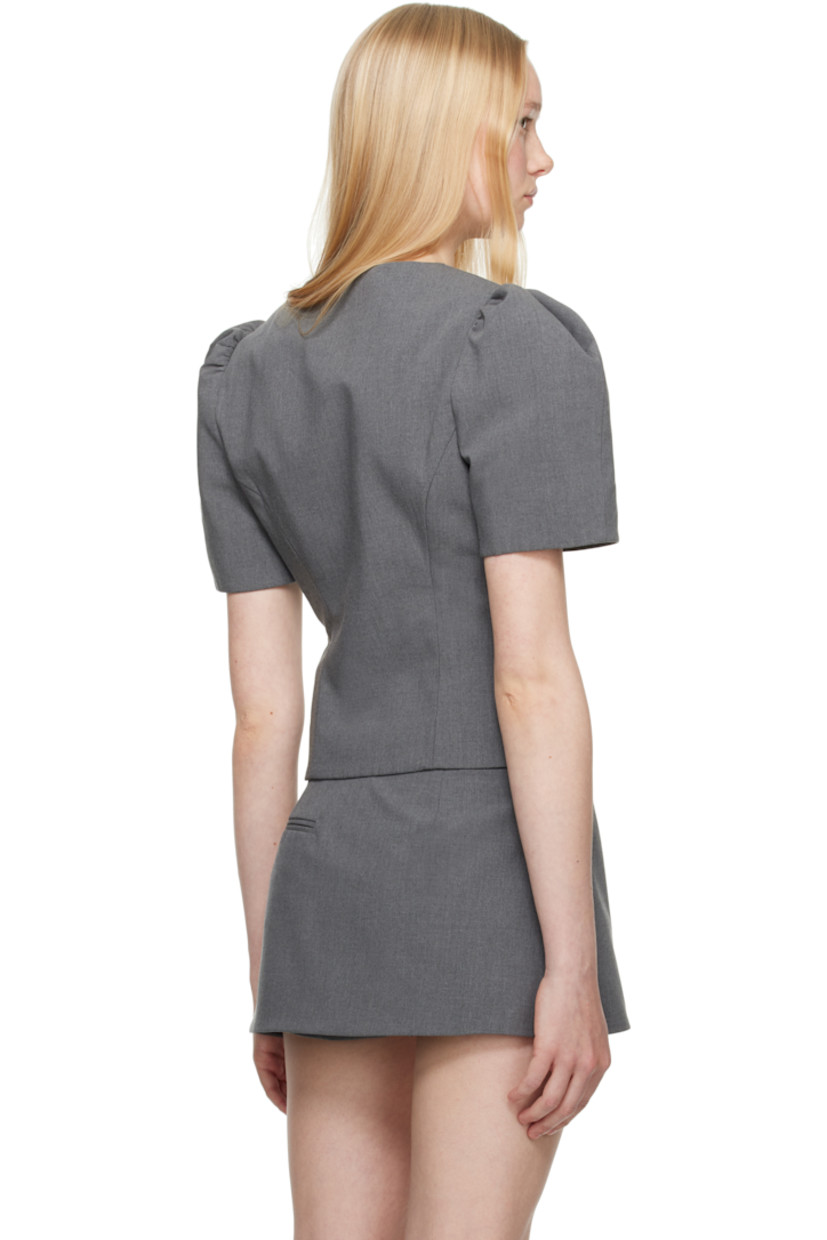 Polyester- and wool-blend twill blouse. 

· Round neck
· Button closure
· Princess seams 
· Padded shoulders
· Puff sleeves
· Logo-woven viscose twill lining

Supplier color: Grey