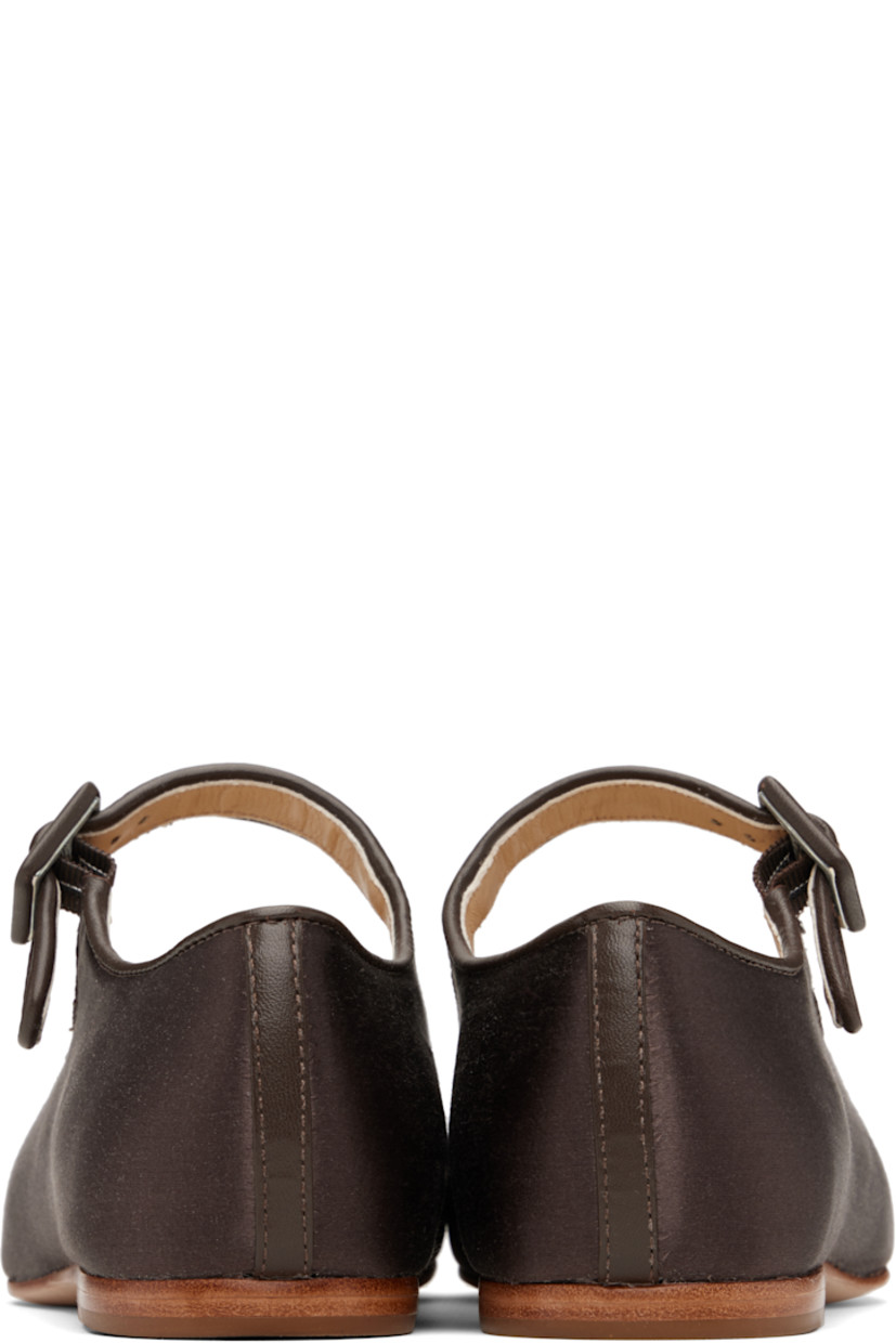 Satin Mary Jane-style ballerina flats in brown.

· Square toe
· Partially elasticized pin-buckle strap at vamp
· Buffed leather trim at collar and heel
· Stacked leather heel with rubber injection
· Nubuck sole

Supplier color: Brunette satin