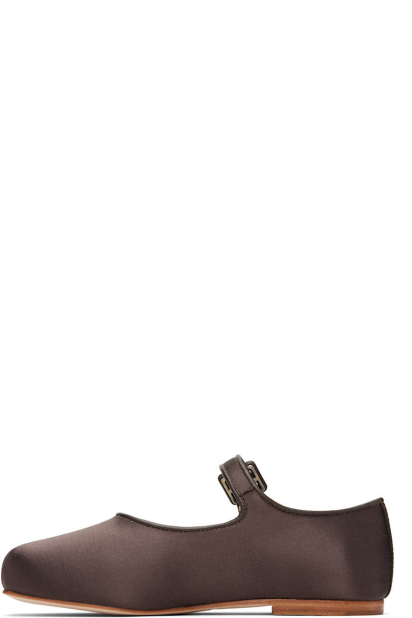 Satin Mary Jane-style ballerina flats in brown.

· Square toe
· Partially elasticized pin-buckle strap at vamp
· Buffed leather trim at collar and heel
· Stacked leather heel with rubber injection
· Nubuck sole

Supplier color: Brunette satin