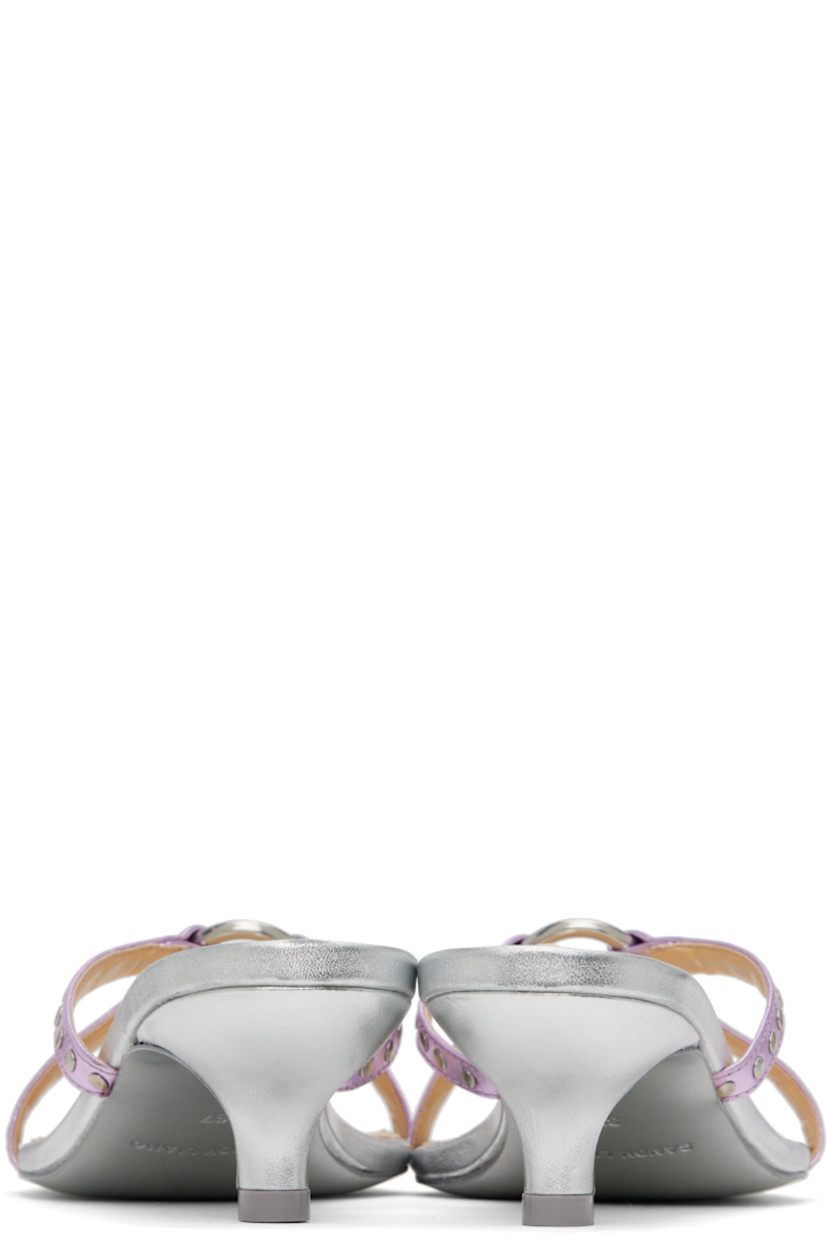 Grained leather heeled sandals in metallic silver tone and pink.

· Open square toe
· Thong-style strap at vamp
· O-ring and studded straps at vamp
· Logo patch at padded footbed
· Covered kitten heel with rubber injection
· Leather sole
· Heel: H1.75"

Supplier color: Metallic pink