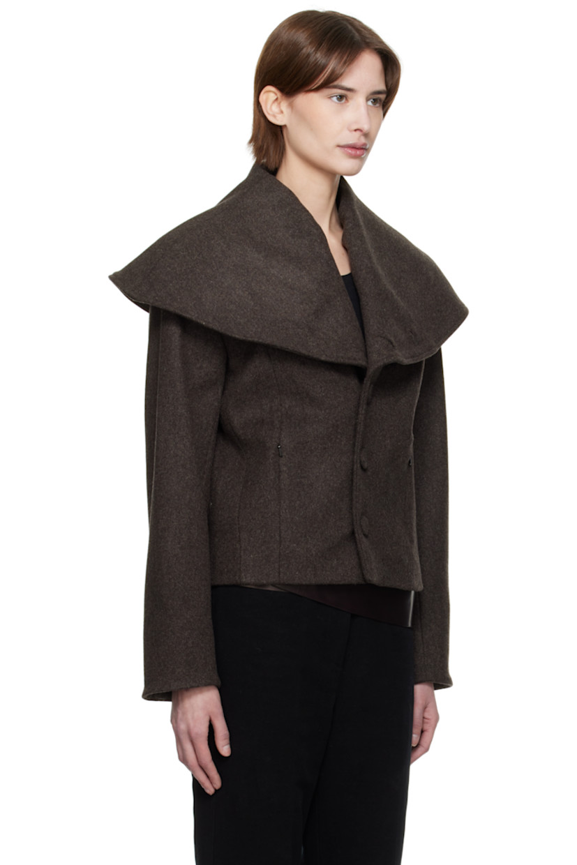 Wool melton jacket.

· Foldover neck extends to shoulders
· Button closure
· Zip seam pockets
· Full cotton lawn cloth lining
· Covered hardware

Supplier color: Brown wool melange
