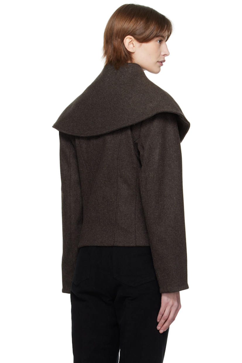 Wool melton jacket.

· Foldover neck extends to shoulders
· Button closure
· Zip seam pockets
· Full cotton lawn cloth lining
· Covered hardware

Supplier color: Brown wool melange