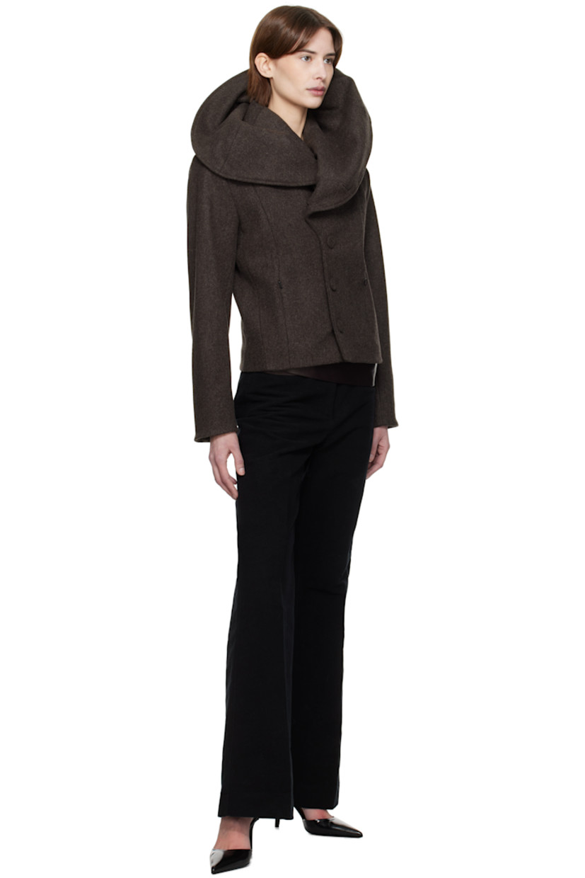 Wool melton jacket.

· Foldover neck extends to shoulders
· Button closure
· Zip seam pockets
· Full cotton lawn cloth lining
· Covered hardware

Supplier color: Brown wool melange
