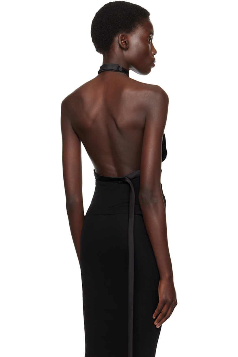 Viscose crêpe top.

· Satin trim throughout
· Adjustable buttoned halter straps
· Extended straps
· Curved hem 
· Low back

Supplier color: Black