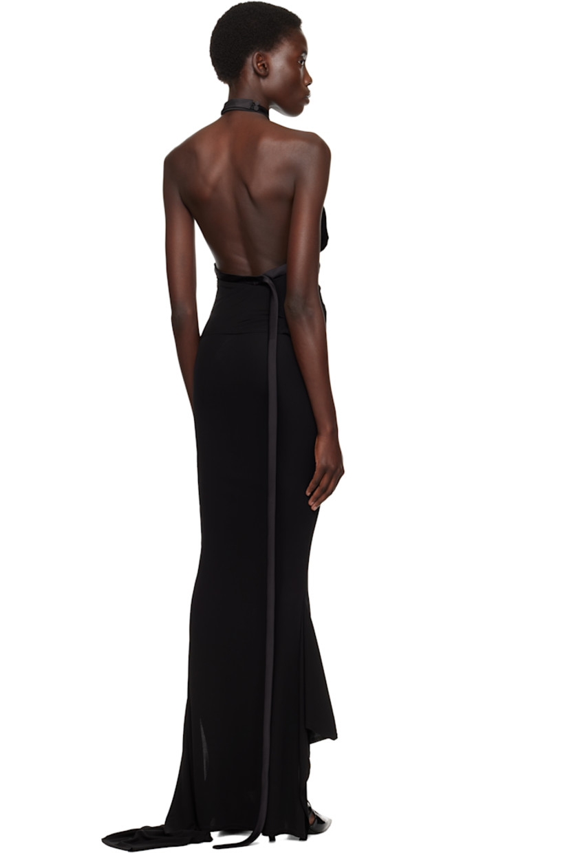 Viscose crêpe top.

· Satin trim throughout
· Adjustable buttoned halter straps
· Extended straps
· Curved hem 
· Low back

Supplier color: Black