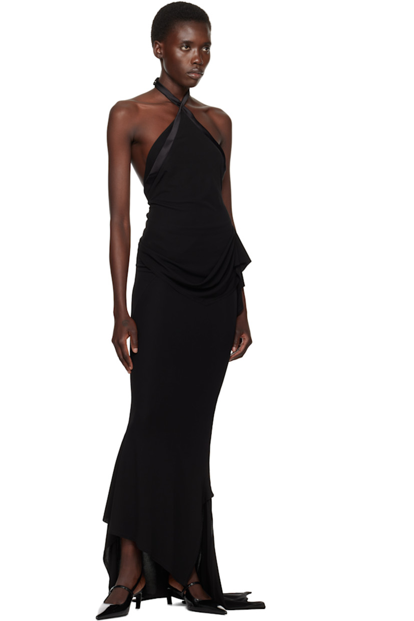Viscose crêpe top.

· Satin trim throughout
· Adjustable buttoned halter straps
· Extended straps
· Curved hem 
· Low back

Supplier color: Black