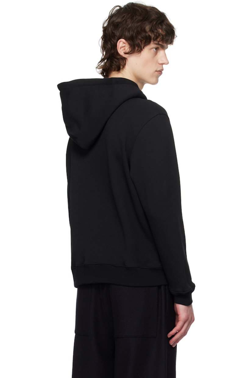 French terry hoodie.

· Drawstring at hood
· Zip closure
· Padded satin logo appliqué at front
· Patch pockets
· Rib-knit hem and cuffs

Supplier color: Black
