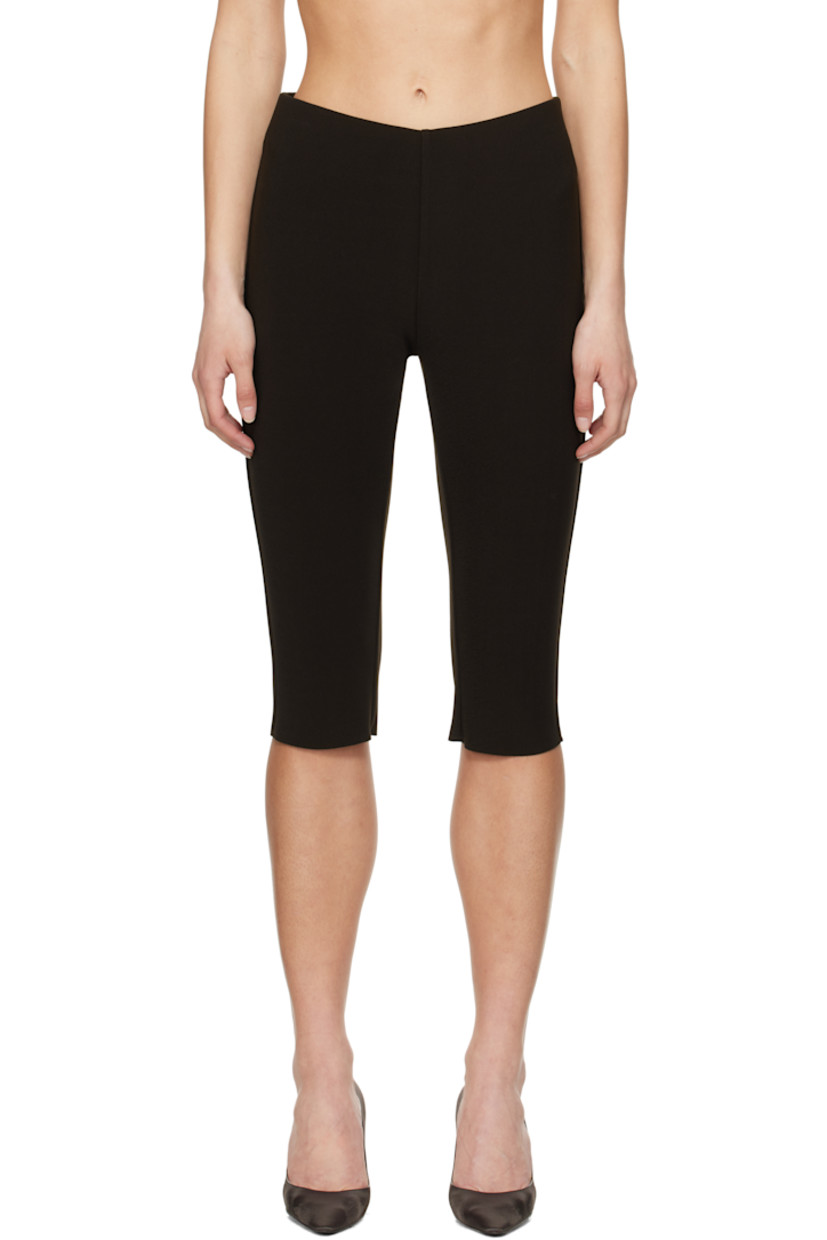 Double-faced stretch polyester bonded crêpe shorts. 

· Elasticized waistband
· Two-pocket styling
· Raw edge at cuffs

Supplier color: Chocolate