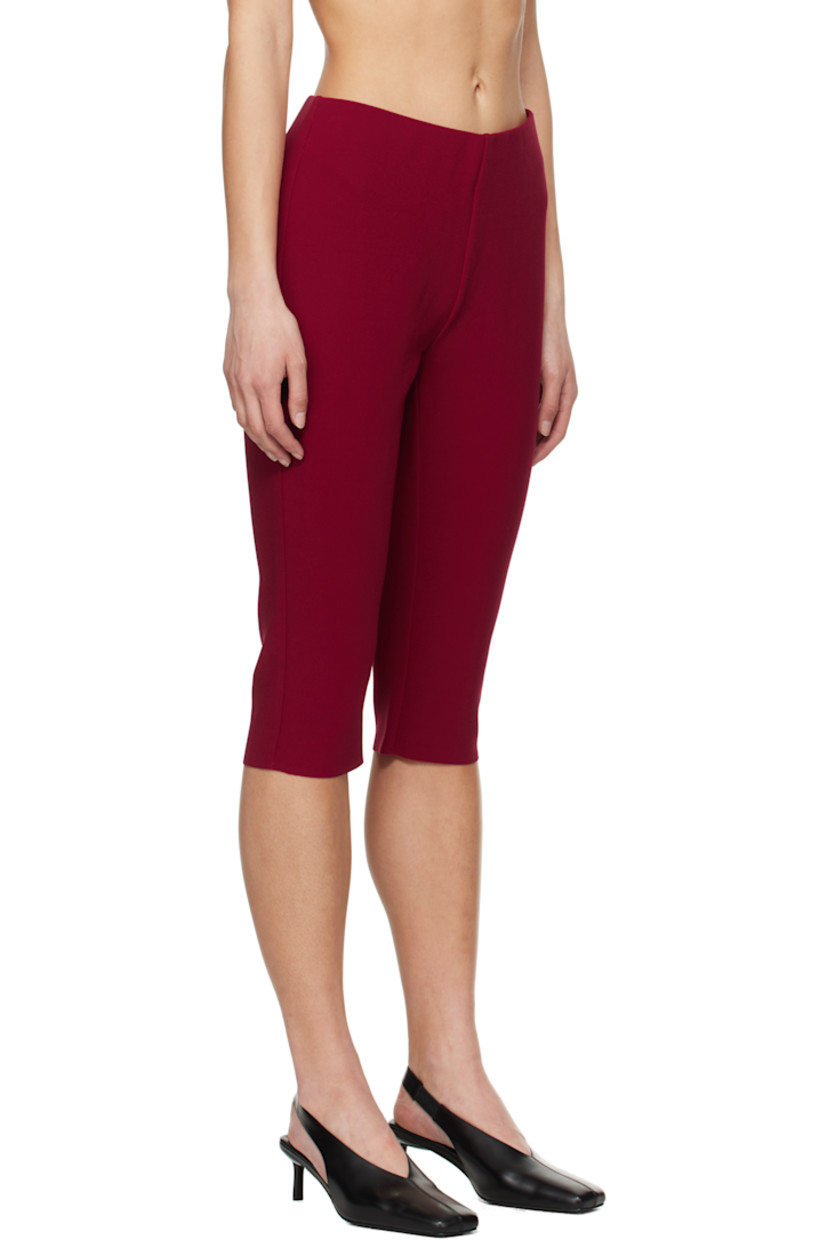 Double-faced stretch polyester bonded crêpe shorts.

· Elasticized waistband
· Two-pocket styling
· Raw edge at cuffs

Supplier color: Ruby