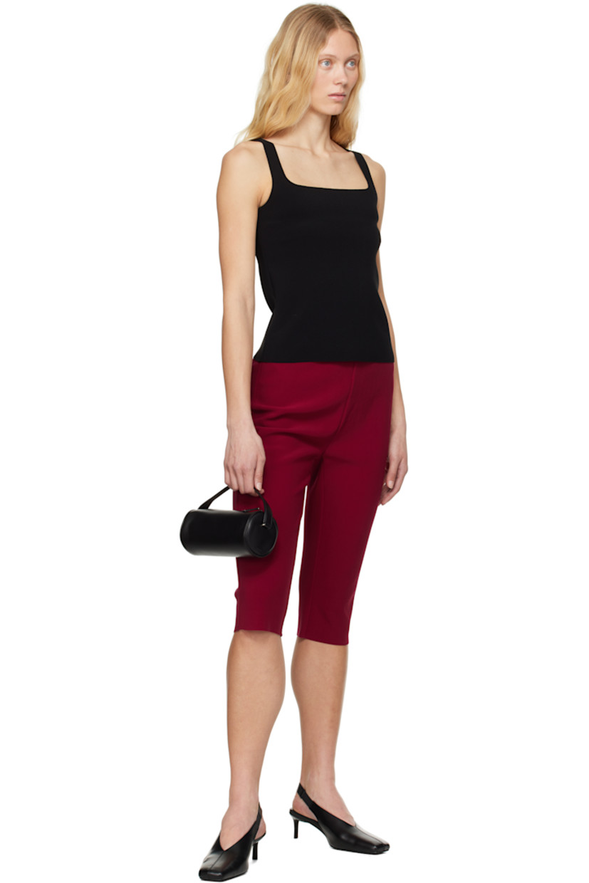 Double-faced stretch polyester bonded crêpe shorts.

· Elasticized waistband
· Two-pocket styling
· Raw edge at cuffs

Supplier color: Ruby