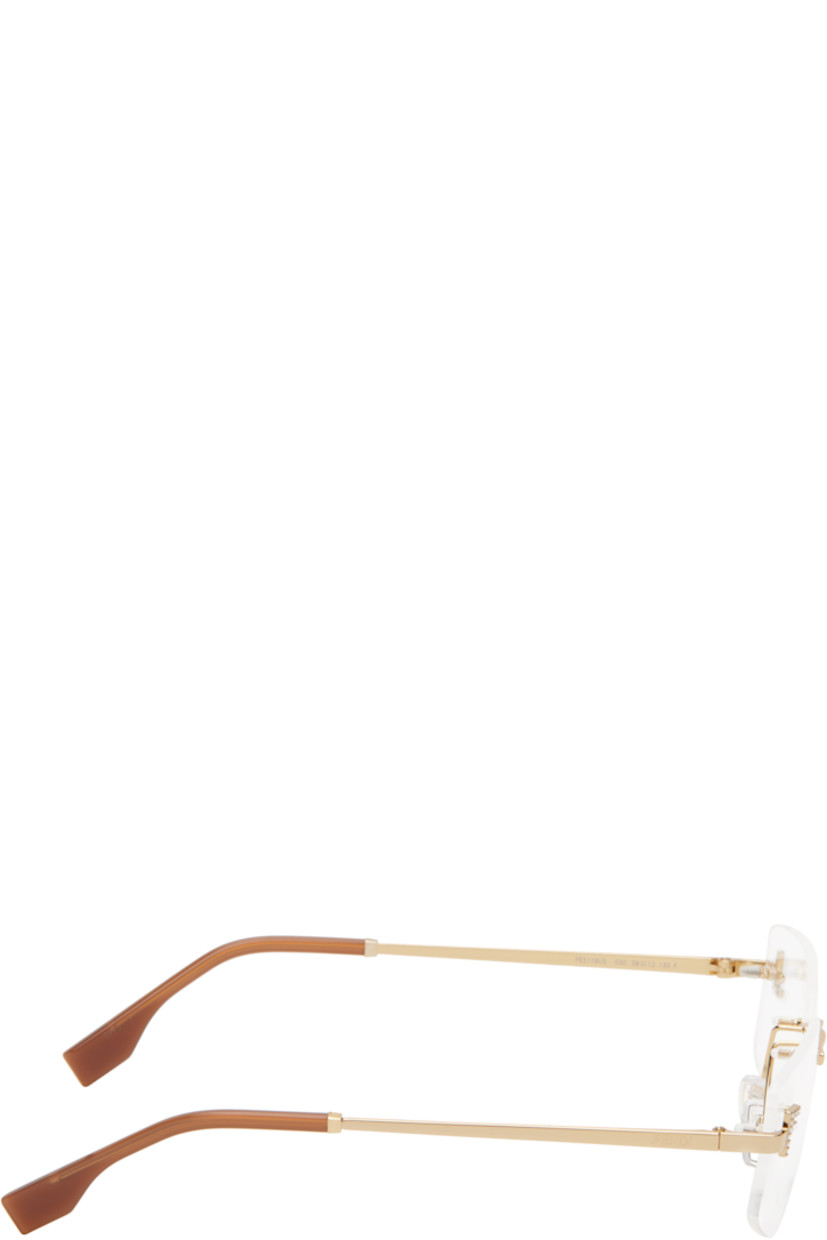 Cat-eye rimless metal-frame optical glasses in gold tone. 

· Adjustable rubber nose pads
· Crystal-cut logo at face 
· Logo embossed at temples
· Acetate temple tips in brown
· Includes pouch 
· Size: 58.12 135 

Supplier color: Shiny endura gold
