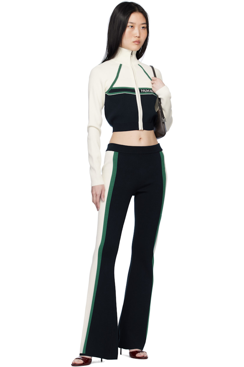Rib-knit viscose-blend jacket.

· Turtleneck
· Zip closure
· Jacquard logo at chest
· Cropped hem
· Raglan sleeves

Supplier color: Navy blue/Off white