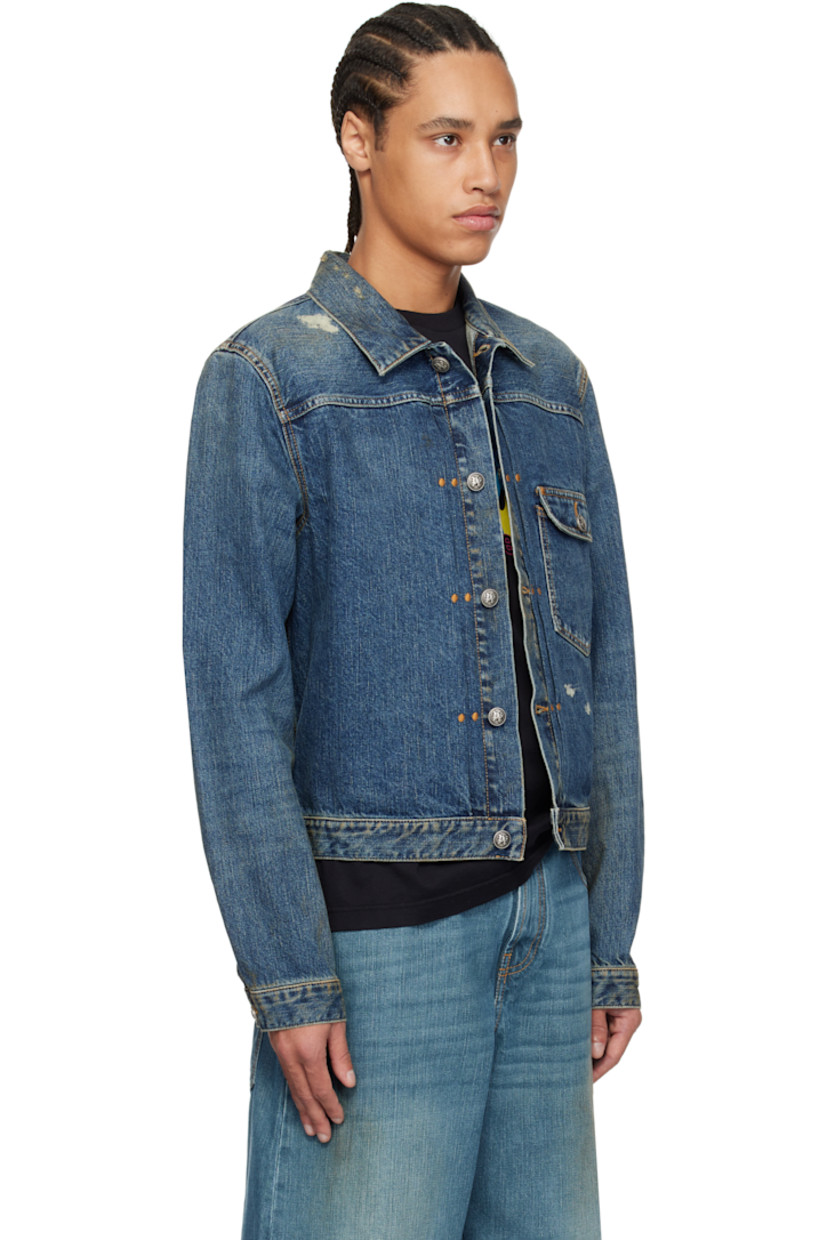 Non-stretch denim jacket. Fading, discoloration, and subtle distressing throughout. 

· Spread collar
· Button closure
· Flap pocket
· Single-button barrel cuffs
· Twin pleats at back yoke
· Logo printed at back
· Cinch tab at back waistband
· Logo-engraved antiqued silver-tone hardware
· Contrast stitching in tan

Supplier color: Blue/Light blue