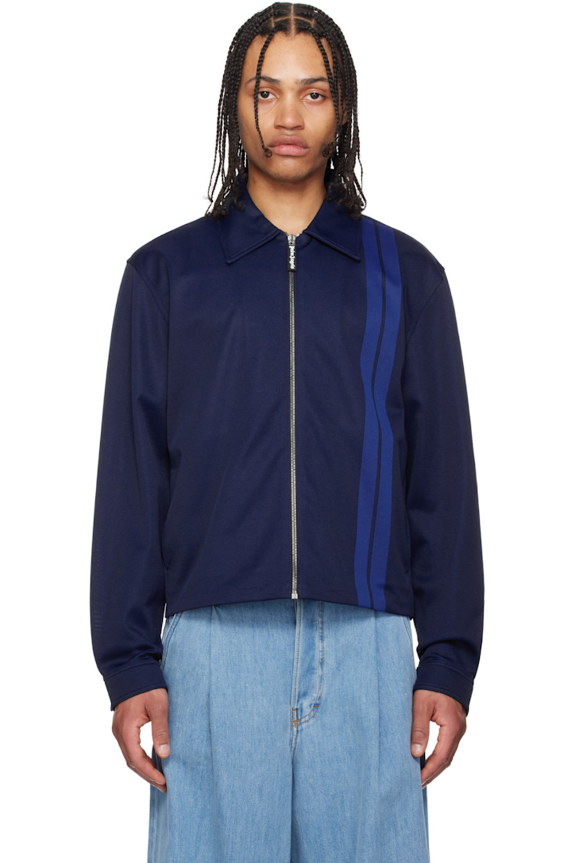 Polyester jersey track jacket. 

· Spread collar
· Zip closure
· Jacquard stripes at front
· Seam pockets
· Dropped shoulders
· Press-stud barrel cuffs

Supplier color: Navy