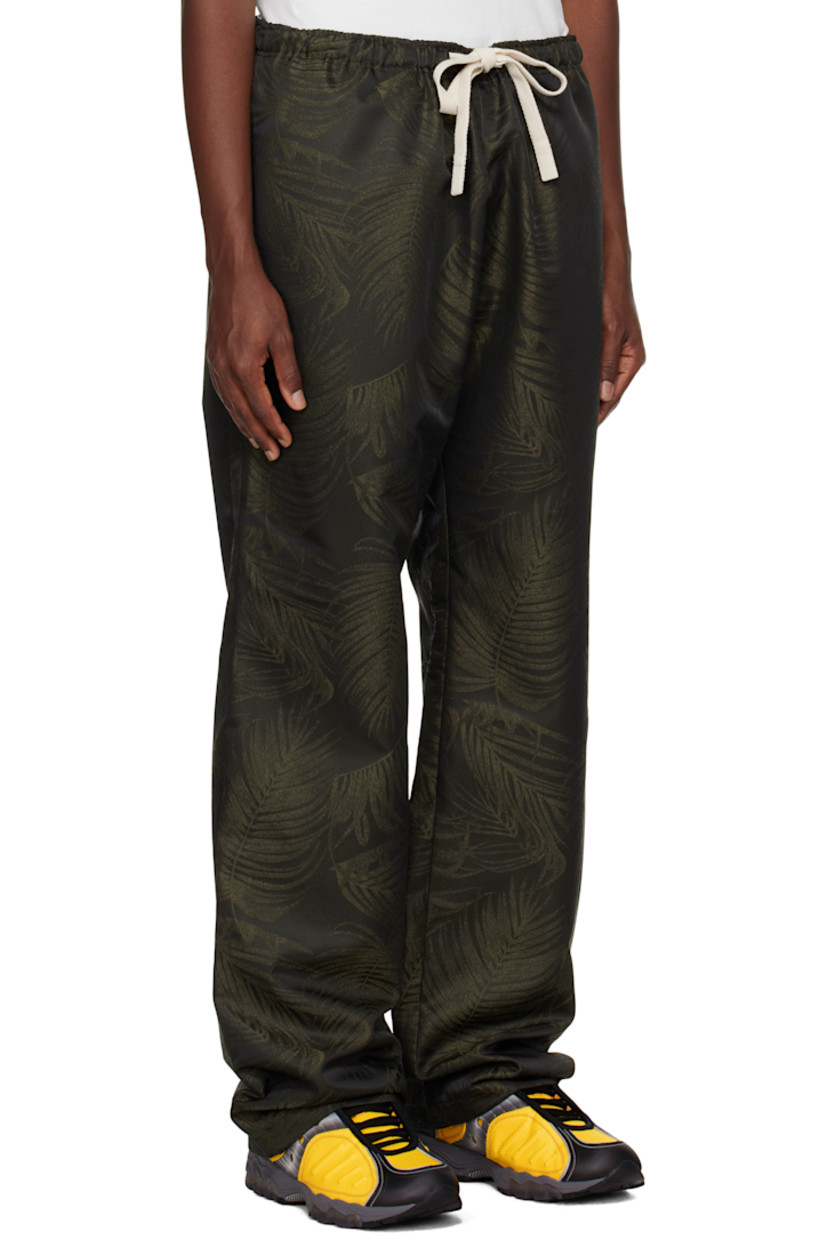 Polyester- and wool-blend sateen lounge pants. Jacquard graphic pattern throughout.

· Drawstring at elasticized waistband
· Four-pocket styling

Supplier color: Military green