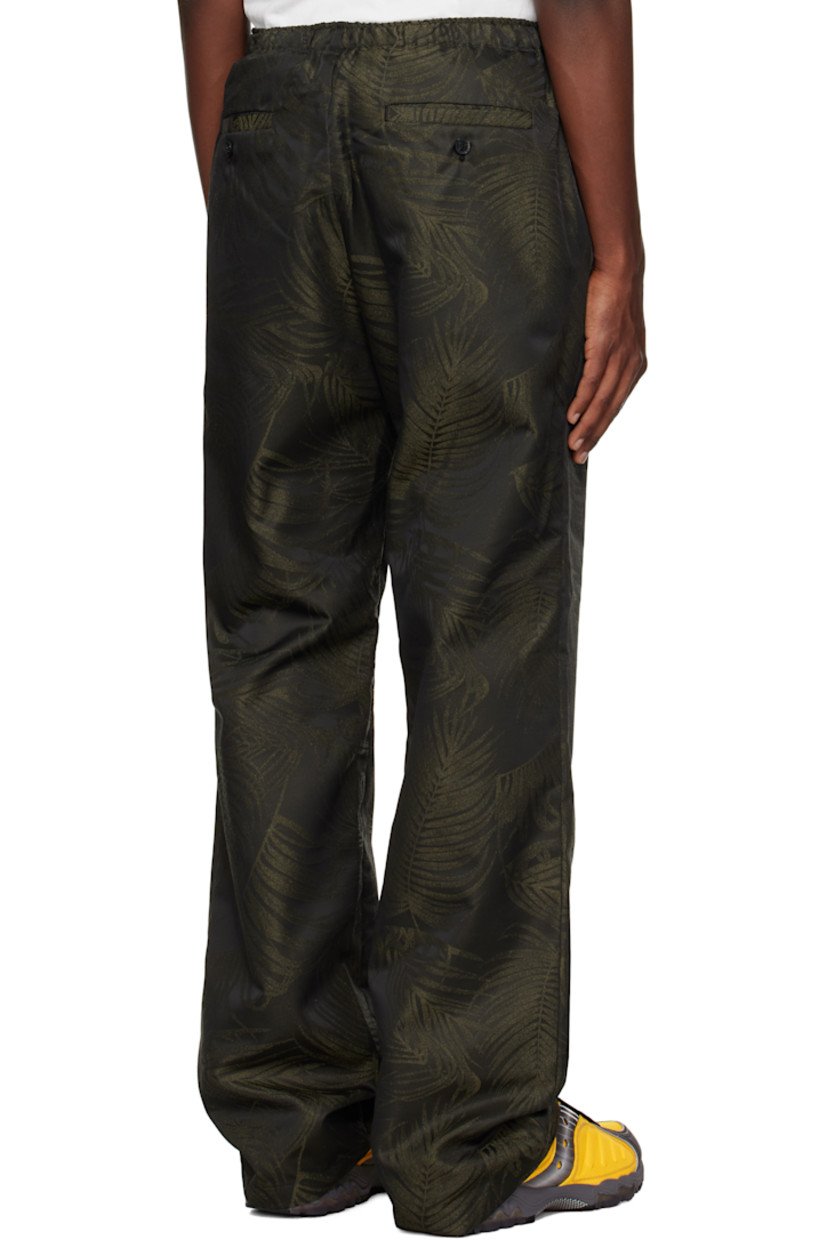 Polyester- and wool-blend sateen lounge pants. Jacquard graphic pattern throughout.

· Drawstring at elasticized waistband
· Four-pocket styling

Supplier color: Military green