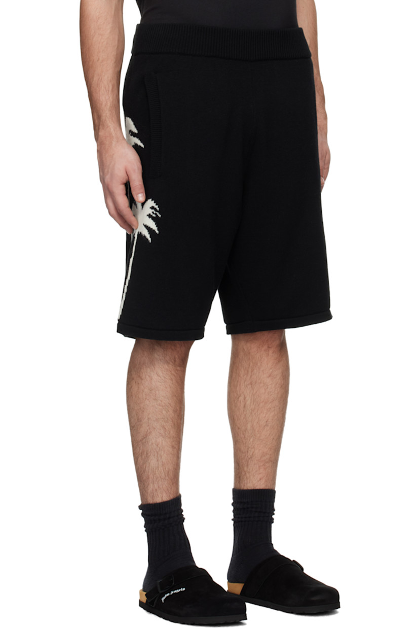 Knit cotton- and extrafine merino wool-blend shorts. Rib-knit trim throughout. 

· Elasticized waistband
· Two-pocket styling
· Jacquard graphic at outseams 

Supplier color: Black/Off white