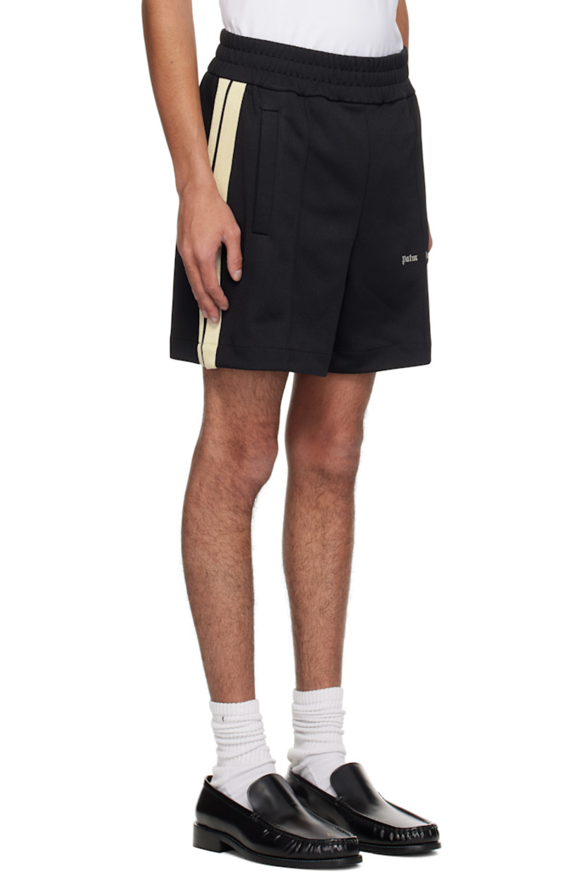 Polyester jersey shorts. 

· Elasticized waistband
· Two-pocket styling
· Pinched seam at legs
· Embroidered logo at leg
· Striped trim at outseams 

Supplier color: Black/Off white