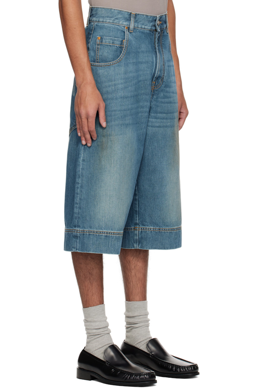 Non-stretch denim shorts. Fading, whiskering, and smudging throughout.

· Belt loops
· Five-pocket styling
· Zip fly
· Leather logo patch at back waistband
· Laser-printed logo at back
· Logo-engraved oxidized silver-tone hardware
· Contrast stitching in tan

Supplier color: Blue/Green