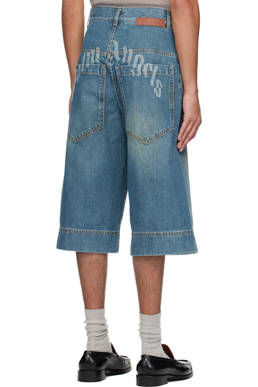 Non-stretch denim shorts. Fading, whiskering, and smudging throughout.

· Belt loops
· Five-pocket styling
· Zip fly
· Leather logo patch at back waistband
· Laser-printed logo at back
· Logo-engraved oxidized silver-tone hardware
· Contrast stitching in tan

Supplier color: Blue/Green