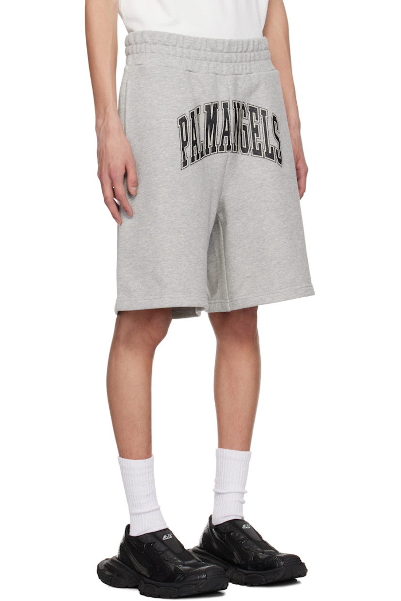 French terry shorts.

· Elasticized waistband
· Two-pocket styling
· Logo and graphic bonded at front 

Supplier color: Grey melange