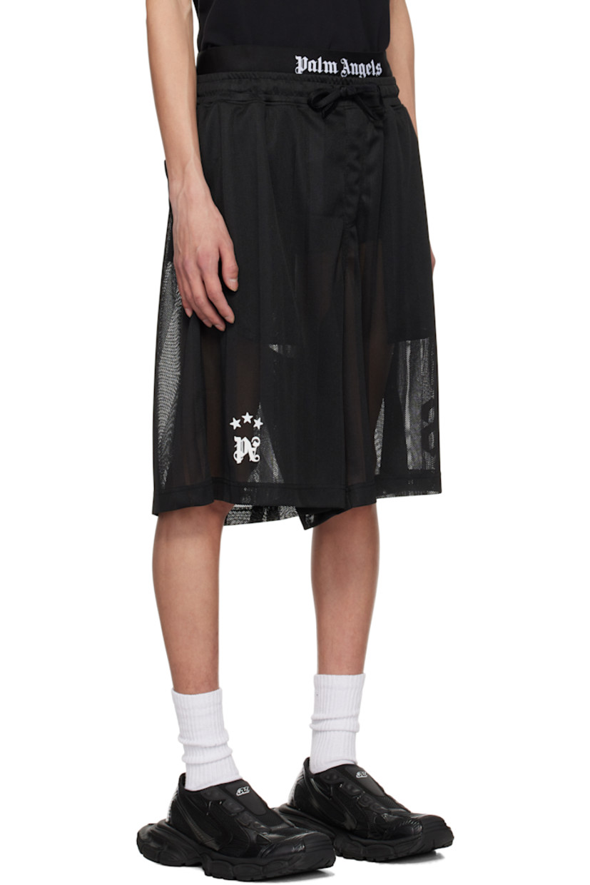 Semi-sheer rib-knit polyester and mesh shorts. Striped throughout. 

· Layered elasticized waistband with jacquard logo
· Drawstring at waistband
· Three-pocket styling
· Rubberized logo patches at front hem 

Supplier color: Black/Off-White