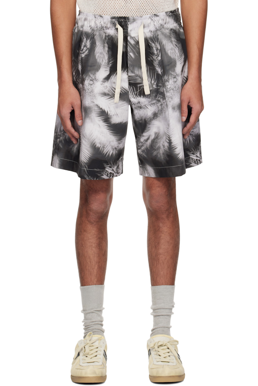 Cotton taffeta shorts. Graphic pattern printed throughout.

· Drawstring at elasticized waistband
· Three-pocket styling
· Mock fly
· Logo flag at back patch pocket
· Contrast stitching in white

Supplier color: Black/Off white
