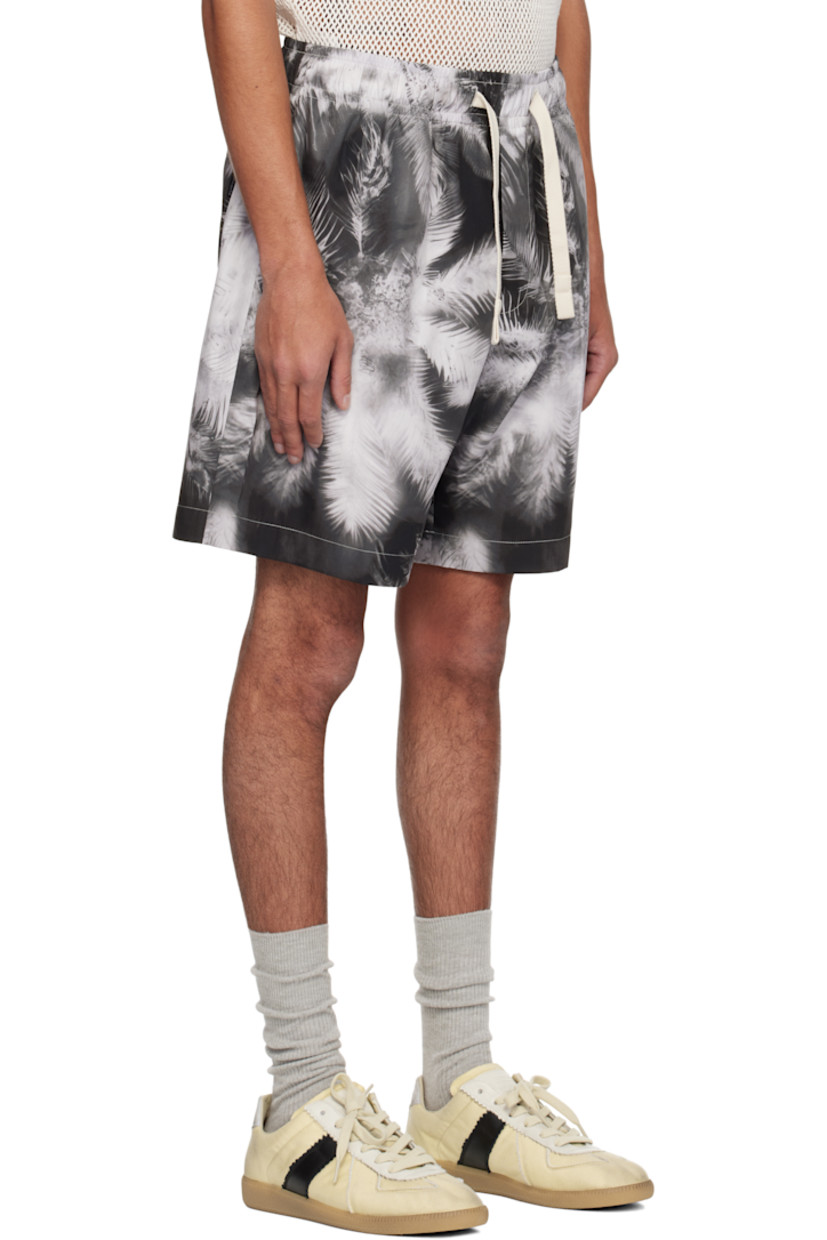 Cotton taffeta shorts. Graphic pattern printed throughout.

· Drawstring at elasticized waistband
· Three-pocket styling
· Mock fly
· Logo flag at back patch pocket
· Contrast stitching in white

Supplier color: Black/Off white