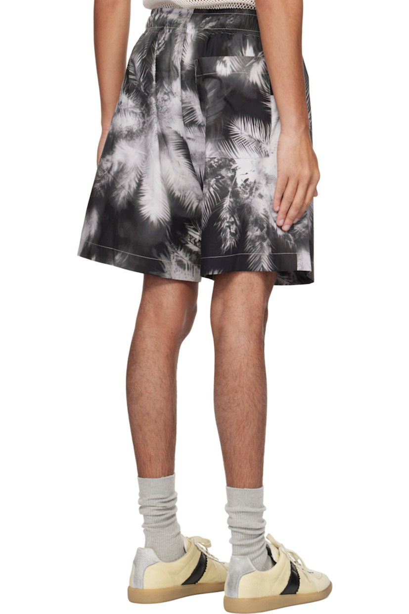 Cotton taffeta shorts. Graphic pattern printed throughout.

· Drawstring at elasticized waistband
· Three-pocket styling
· Mock fly
· Logo flag at back patch pocket
· Contrast stitching in white

Supplier color: Black/Off white