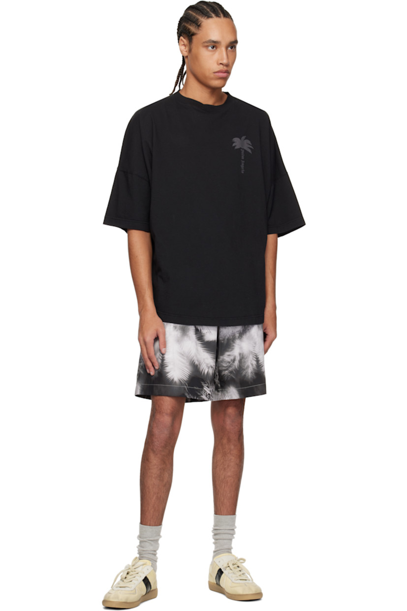 Cotton taffeta shorts. Graphic pattern printed throughout.

· Drawstring at elasticized waistband
· Three-pocket styling
· Mock fly
· Logo flag at back patch pocket
· Contrast stitching in white

Supplier color: Black/Off white